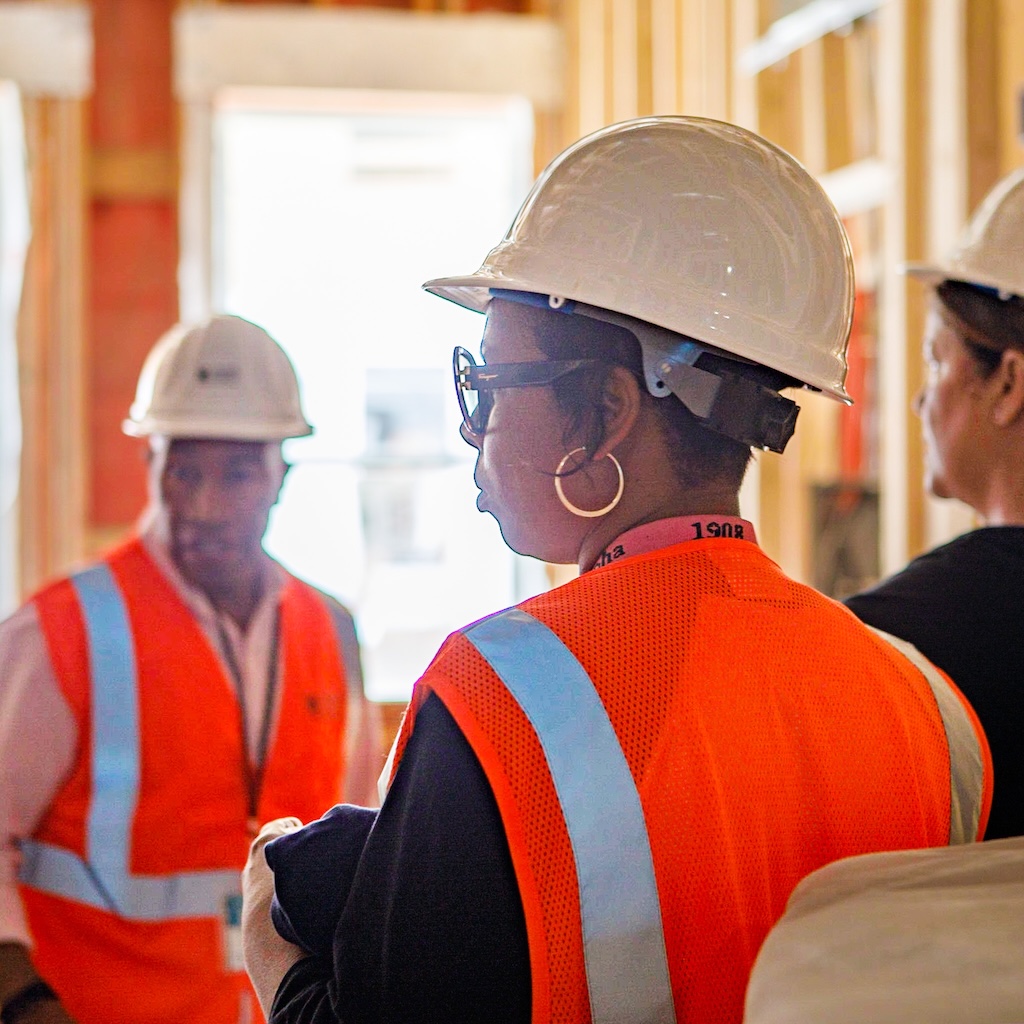 HABC Operations staff walking through Somerset 2 under construction at the Somerset 2 Topping Off Event